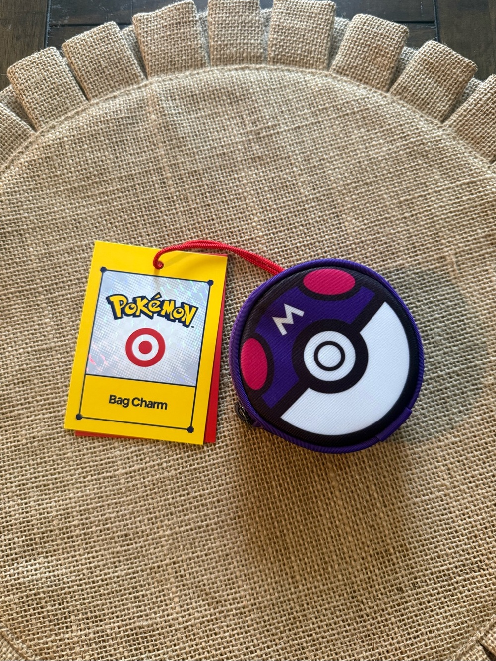 Target Purple Round Zip Bag Charm with Red Strap
